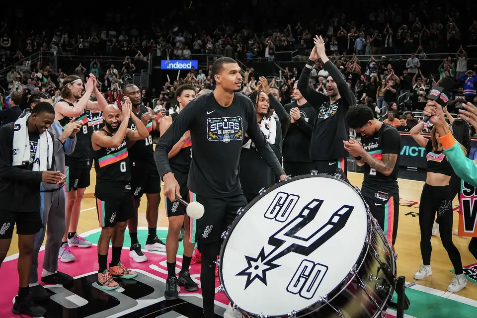 San Antonio Spurs forward Victor Wembanyama (1) leads the team and fans in a cheer after the Spurs 121-94 win over the Phoenix Suns on Thursday night, Feb. 19, 2026 in the first of two “I-35 Series” games in Austin at the Moody Center.