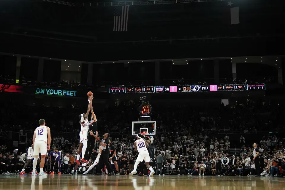 San Antonio Spurs forward Victor Wembanyama (1) and Phoenix Suns center Mark Williams (15) battle for the tip-off in the first quarter as the Spurs take on the Suns on Thursday night, Feb. 19, 2026 in the first of two “I-35 Series” games in Austin at the Moody Center. The Spurs won the game 121-94.