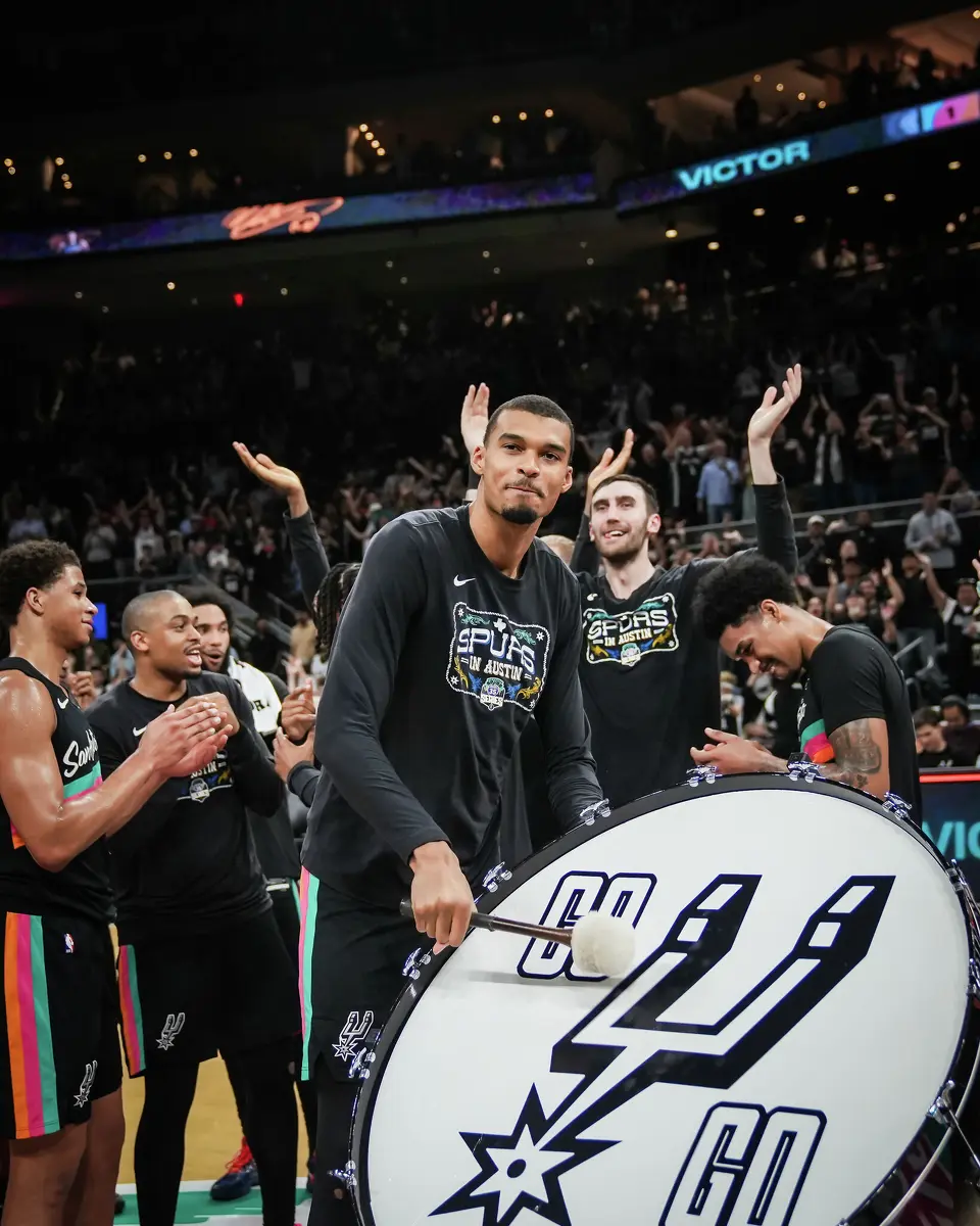 San Antonio Spurs forward Victor Wembanyama (1) leads the team and fans in a cheer after the Spurs 121-94 win over the Phoenix Suns on Thursday night, Feb. 19, 2026 in the first of two “I-35 Series” games in Austin at the Moody Center.