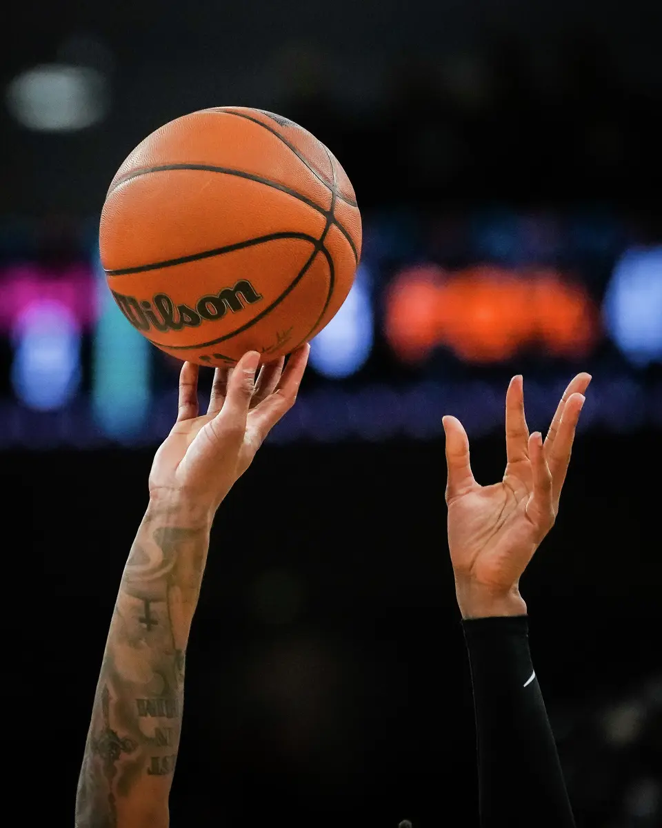 San Antonio Spurs guard/forward Devin Vassell (24) shoots for three points in the second quarter as the Spurs take on the Suns on Thursday night, Feb. 19, 2026 in the first of two “I-35 Series” games in Austin at the Moody Center. The Spurs won the game 121-94.