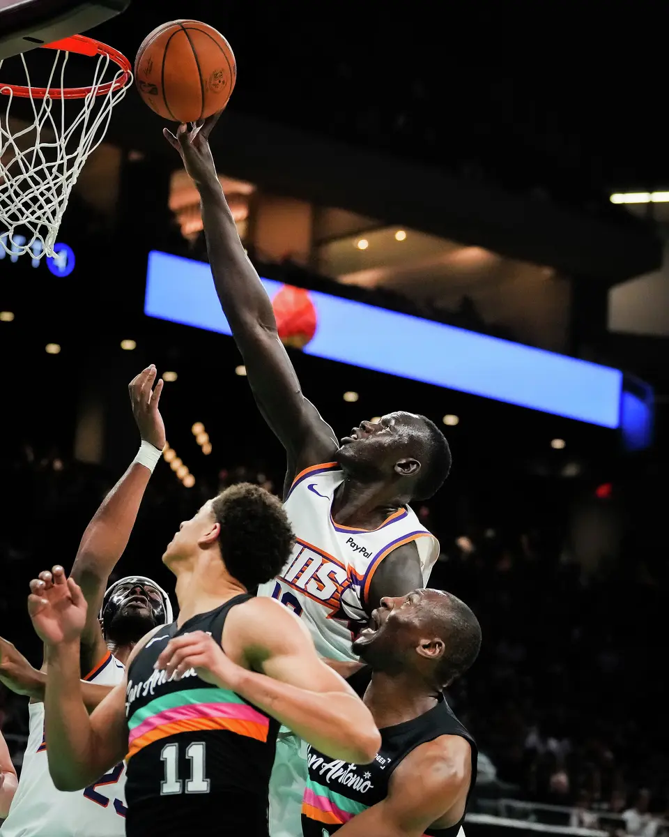 Phoenix Suns center Khaman Maluach (10) puts the ball uo in the fourth quarter as the Spurs take on the Suns on Thursday night, Feb. 19, 2026 in the first of two “I-35 Series” games in Austin at the Moody Center. The Spurs won the game 121-94.
