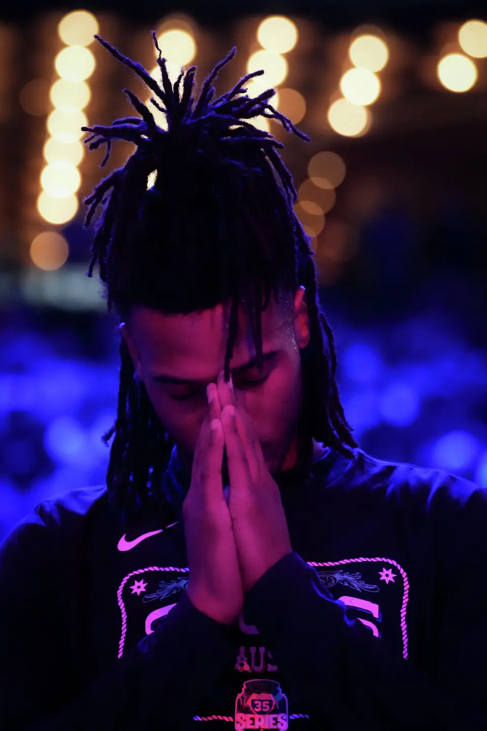 San Antonio Spurs guard Stephon Castle (5) prays during the National Anthem ahead of the Spurs’ game against the Phoenix Suns on Thursday night, Feb. 19, 2026, the first of two “I-35 Series” games in Austin at the Moody Center. The Spurs won the game 121-94.
