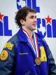 Ben Jaggers from Anderson receives his bronze medal in the boys 50-yard freestyle at the UIL State 5A Swimming and Diving Championships at the Lee and Joe Jamail Texas Swimming Center in Austin, Feb. 21, 2026.
