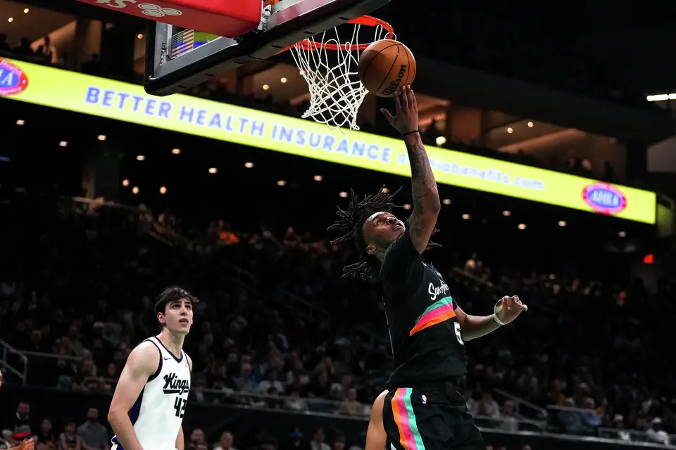 San Antonio Spurs guard Stephen Castle (5) shoots the ball during the game against the Sacramento Kings at the Moody Center on Saturday, Feb. 21, 2026 in Austin.