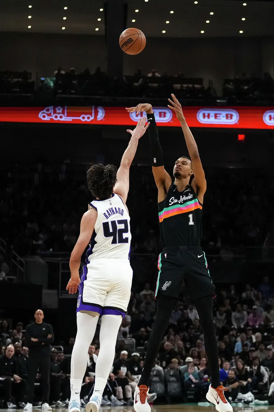 San Antonio Spurs forward Victor Wembanyama (1) shoots the ball over Sacramento Kings center Maxine Raynaud (42) during the game at the Moody Center on Saturday, Feb. 21, 2026 in Austin.