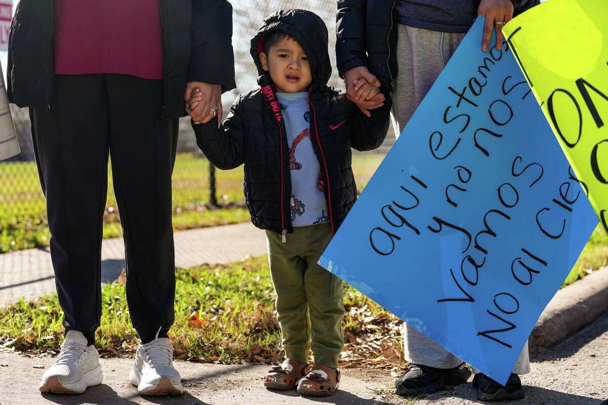 Arian Saucedo, 3, whose parent is a teacher at Port Houston Elementary, attends a protest against the school's planned closure in Houston on Monday, Feb. 23, 2026.