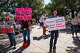 Advocacy groups and community members protest laws surrounding data centers while outside the Texas Capitol in Austin Monday, Feb. 23, 2026. Protestors are advocating for counties to gain legal authority to regulate data center development or enact a statewide pause until protections are in place.