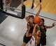 Lake Travis Cavaliers guard Aaron Mathis (11) lays up to the basket against the Round Rock Dragons during the third period at the Bi-District Class 6A-Div 1 boys basketball playoff round on Tuesday, Feb 24, 2026, at Eastside Early College High School in Austin, TX.
