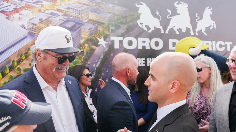 Houston Texans Chair and CEO Cal McNair visits after the organization announced the development of a new, 83-acre headquarters and practice facility space named the 'Toro District' in the Bridgeland master-planned community in Northwest Harris County in Cypress, Wednesday, Feb. 25, 2026. The project will included a 22-acre headquarters and training complex with plans to open the facility in 2029.