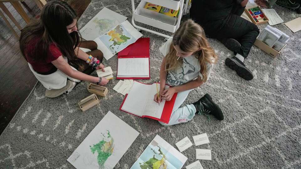 Students work in a classroom at MindSprout Montessori in Spring, Texas, on Wednesday, Feb. 25, 2026.