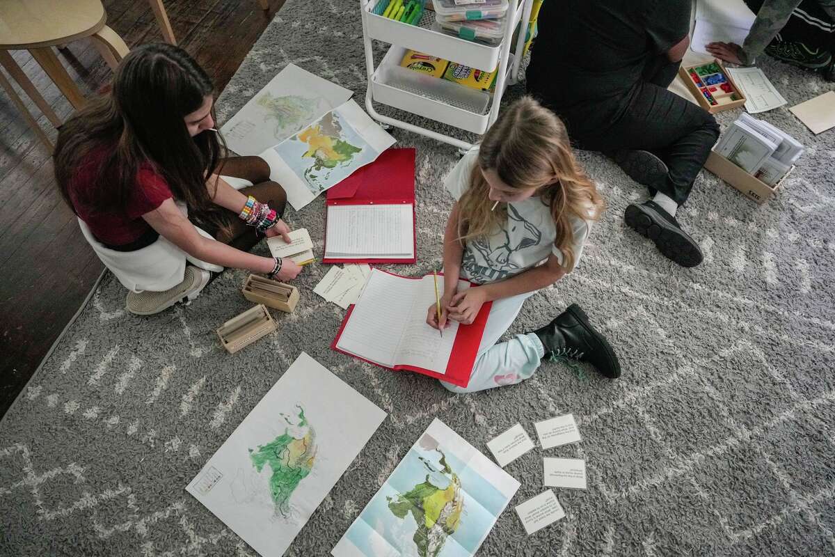 Students work in a classroom at MindSprout Montessori in Spring, Texas, on Wednesday, Feb. 25, 2026.