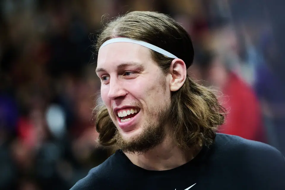 San Antonio Spurs' Kelly Olynyk warms up ahead of the first half of an NBA basketball game against the Toronto Raptors in Toronto, on Wednesday, Feb. 25, 2026. (Sammy Kogan/The Canadian Press via AP)