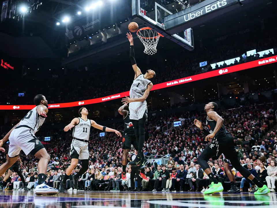 San Antonio Spurs' Victor Wembanyama (1) jumps to block a shot during the first half of an NBA basketball game against the Toronto Raptors in Toronto, on Wednesday, Feb. 25, 2026. (Sammy Kogan/The Canadian Press via AP)