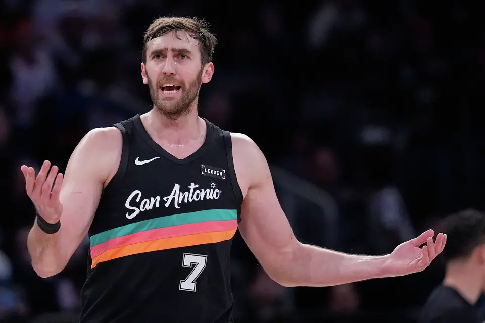 San Antonio Spurs' Luke Kornet reacts to a call during the first half of an NBA basketball game against the New York Knicks Sunday, March 1, 2026, in New York. (AP Photo/Seth Wenig)