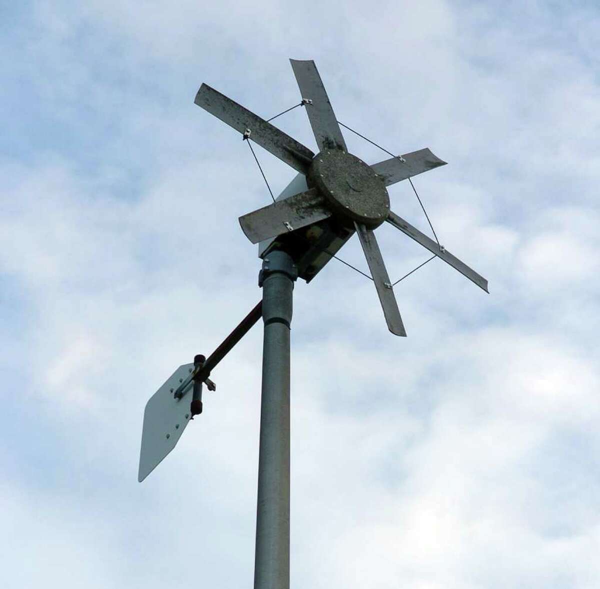This is a view of a small wind turbine built by Henry D. Rotman behind his house in Milford, Conn. on Tuesday December 7, 2010. It was constructed to generate electric power in 1985. Rotman sucessfully used the power to charge a series of gel batteries used for a diving project. As a former UI engineer, he doubts wind power will work well in Connecticut, due to the unpredictability of the wind here and its lack of sustained strength.