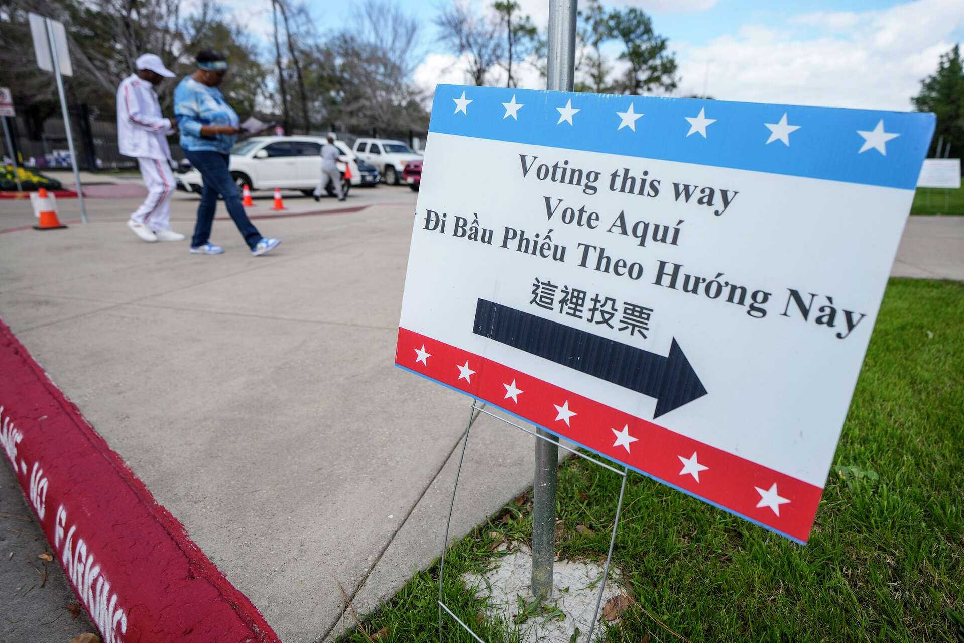 Voters make their way into the polling place at Lone Star College Victory Campus in Houston, Tuesday, March 3, 2026.