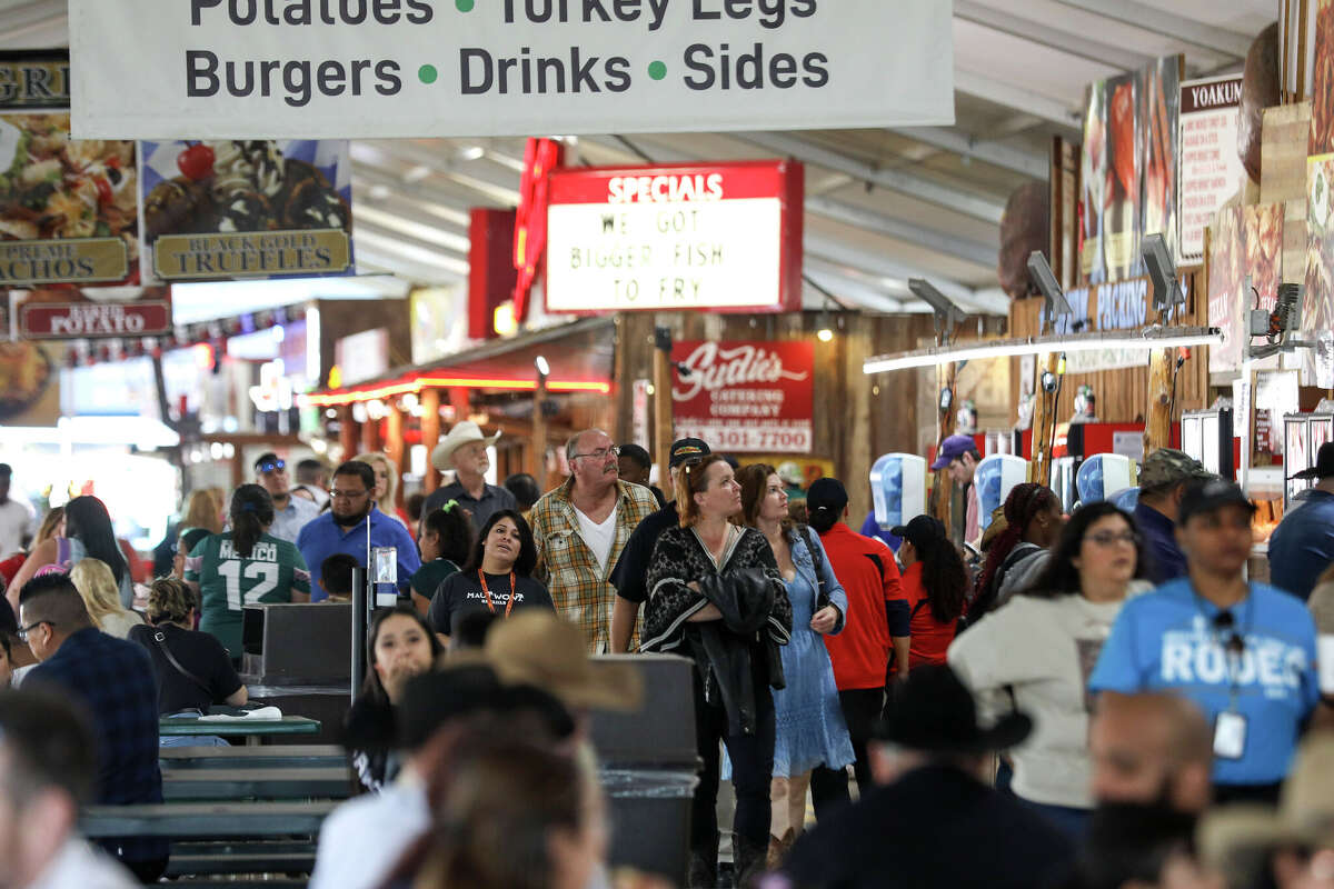 People look for food at the Houston Livestock Show and Rodeo on Thursday, March 5, 2020, at NRG Stadium in Houston.