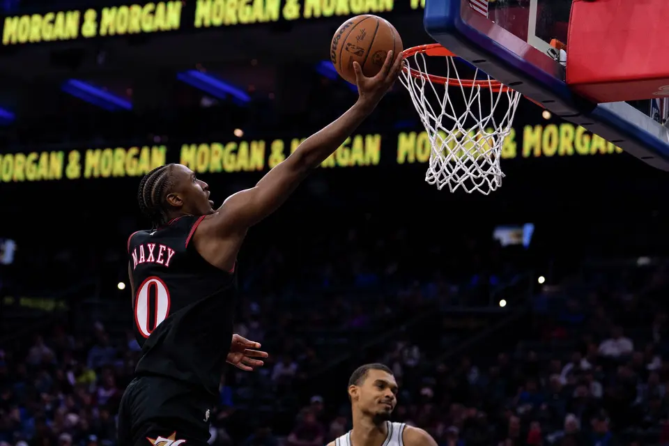 Philadelphia 76ers' Tyrese Maxey goes up for the shot during the second half of an NBA basketball game against the San Antonio Spurs, Tuesday, March 3, 2026, in Philadelphia. (AP Photo/Chris Szagola)