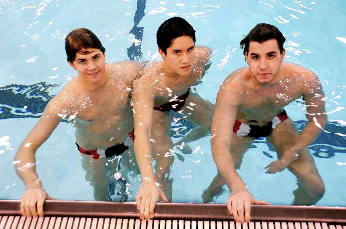 Greenwich High School's swim team captains, from left: Andrew Dillinger, Michael Dustin and Eric Minowitz, at the school pool on Monday, Dec. 13, 2010.