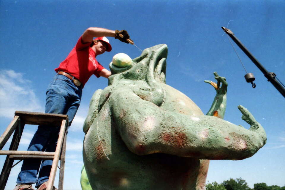 Why are there giant frogs on top of a Lower Greenville Taco Cabana