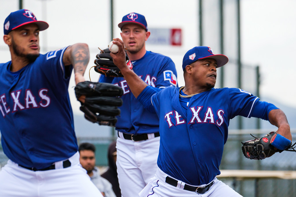 Photos: Lance Lynn, Jeff Mathis among new faces on display for drizzly ...