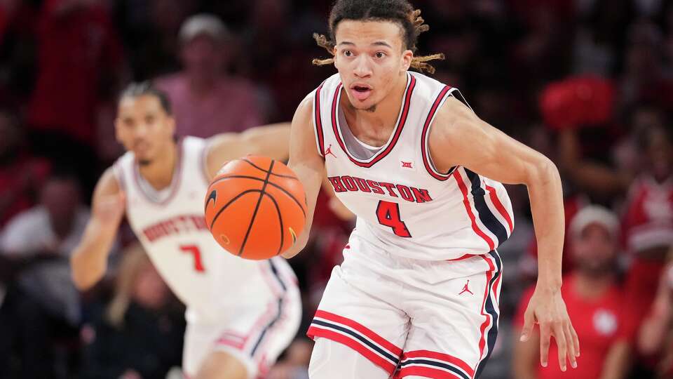 Houston Cougars guard Kingston Flemings (4) starts a fast break during the second half a NCAA college basketball game in Houston, Wednesday, March 4, 2026.
