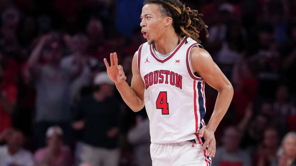 Houston Cougars guard Kingston Flemings (4) reacts after hitting a 3-pointer during the second half a NCAA college basketball game in Houston, Wednesday, March 4, 2026.