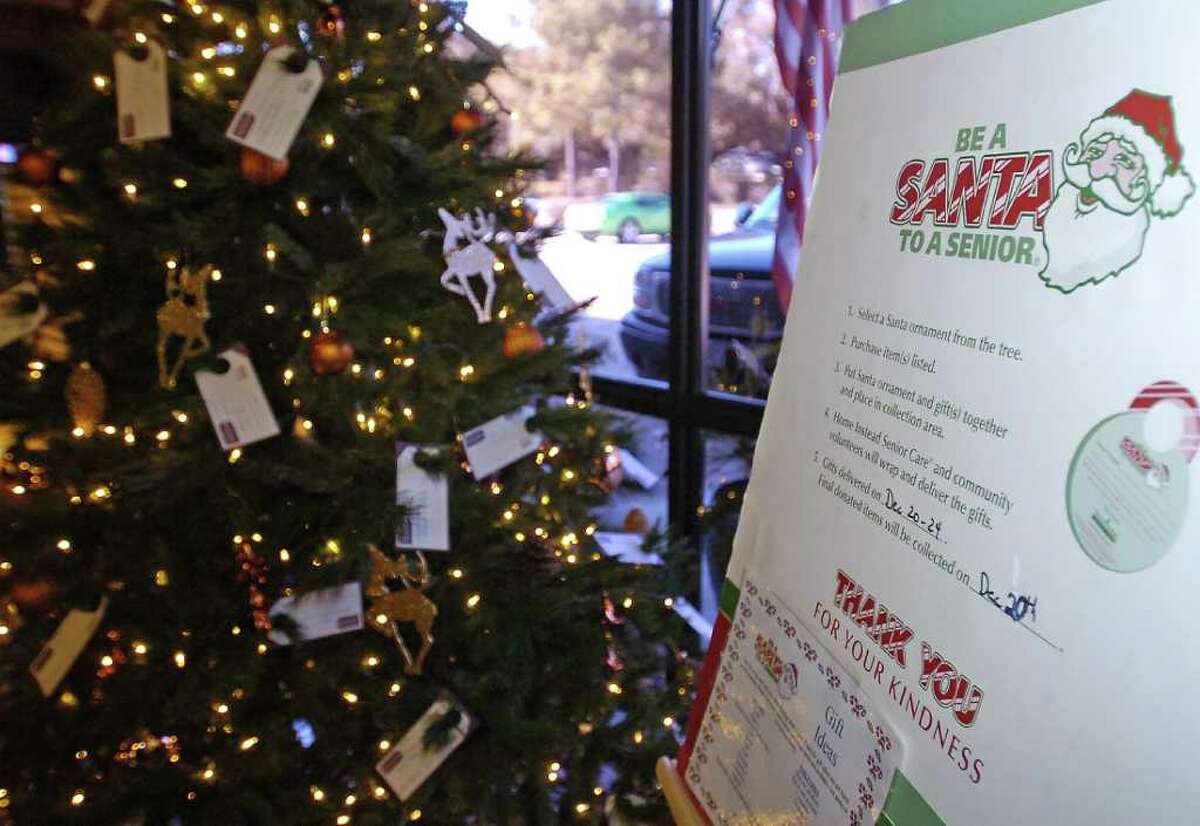Home Instead Senior Care is running the "Be A Santa To A Senior" program around the area and they are looking for people to donate presents to help senior citizens with the holiday season. The Bronze Body tanning facility on Dowlen has a tree in their lobby with cards tied to the branches with names and needs on them. This sign also explains the program. Dave Ryan/The Enterprise