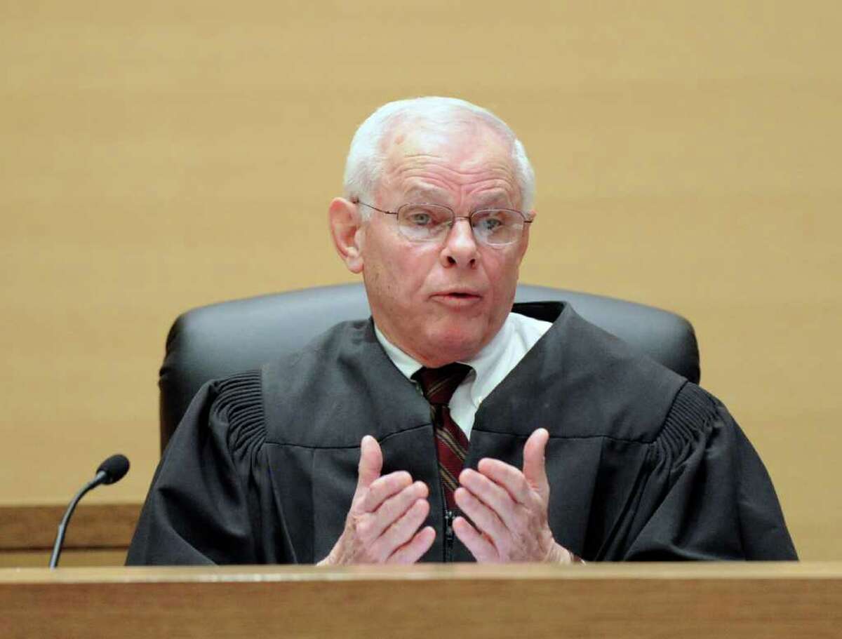 Judge Richard Comerford presides during the trial of defendant Carlos Trujillo, who is accused in the slaying of Andrew Kissel, at state Superior Court in Stamford on Tuesday, Dec. 14, 2010.
