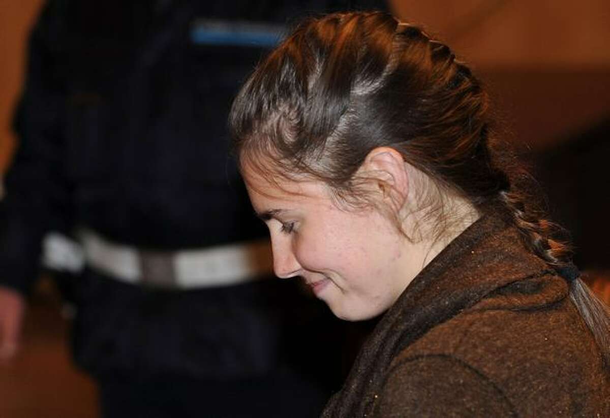 Amanda Knox reacts during the closing arguments of her murder trial in Perugia, Italy. (Photo by Giuseppe Bellini/Getty Images)