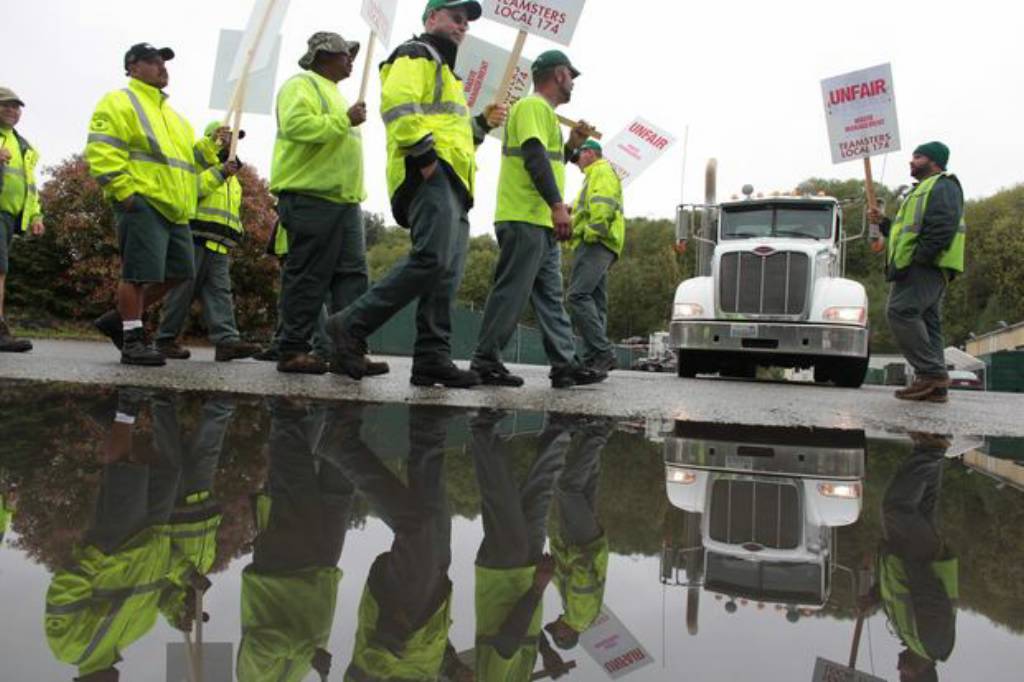 Garbage truck drivers go on strike against Waste Management