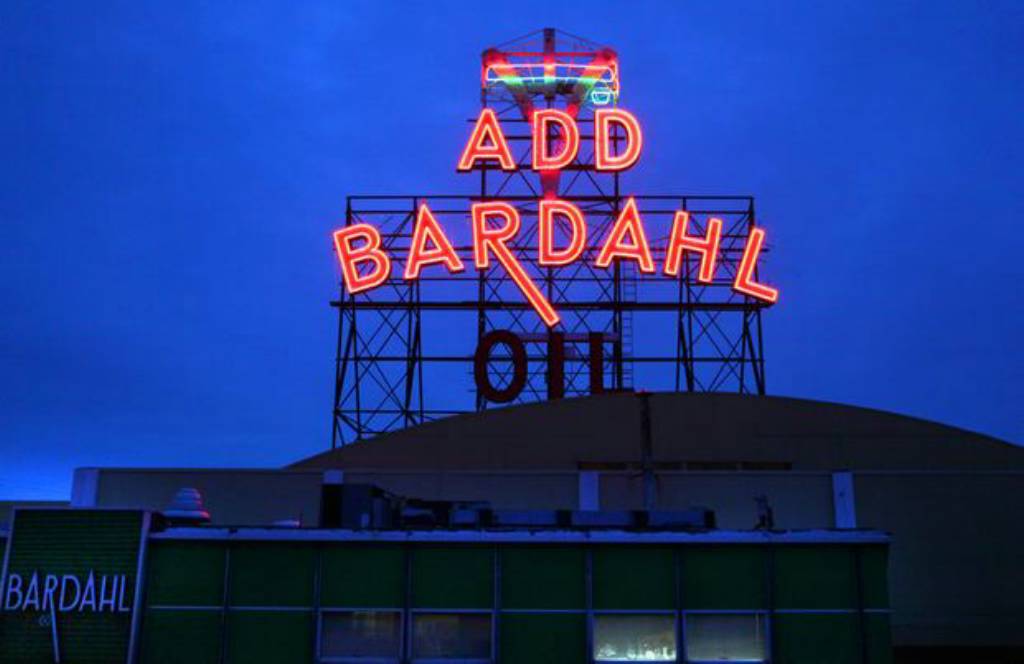Seattle's neon signs pierce the winter darkness