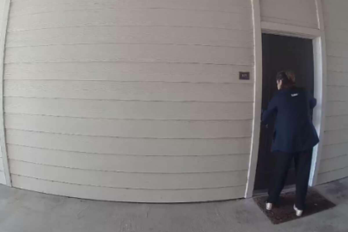 A neighbor's camera captured a Texas TV reporter trying the door of the Austin shooter's apartment.