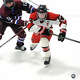 Cullen Sturdevant, left, of BBDI and Luke Kondub of Masuk fight for the puck at the Rinks at Shelton Sports Center on February 16, 2026.
