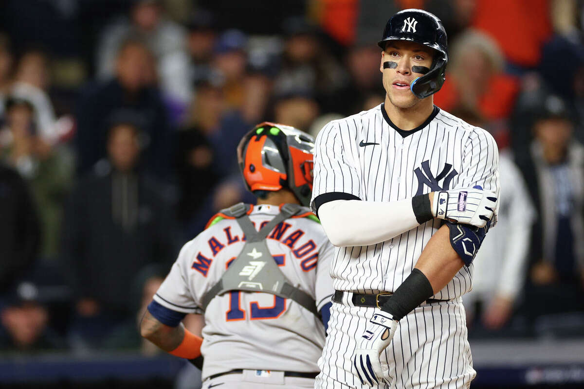 NEW YORK, NEW YORK - OCTOBER 23: Aaron Judge #99 of the New York Yankees reacts after striking out to end the sixth inning against the Houston Astros in game four of the American League Championship Series at Yankee Stadium on October 23, 2022 in the Bronx borough of New York City. (Photo by Elsa/Getty Images)
