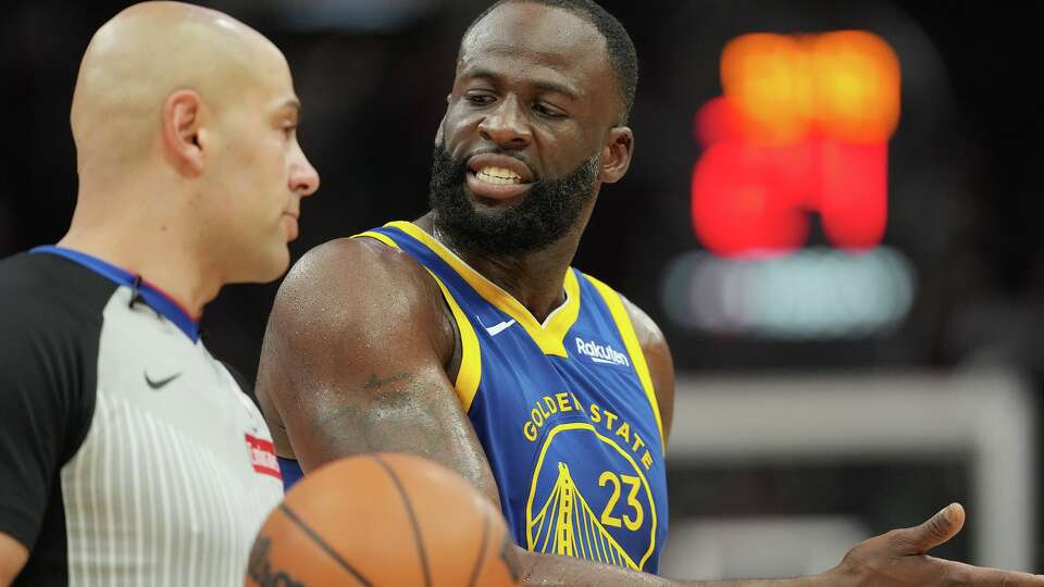 Golden State Warriors forward Draymond Green (23) complains about a foul call as the team takes on the Houston Rockets at the Toyota Center in Houston on Thursday, March 5, 2026. Golden State Warriors won the game in overtime 115-113.