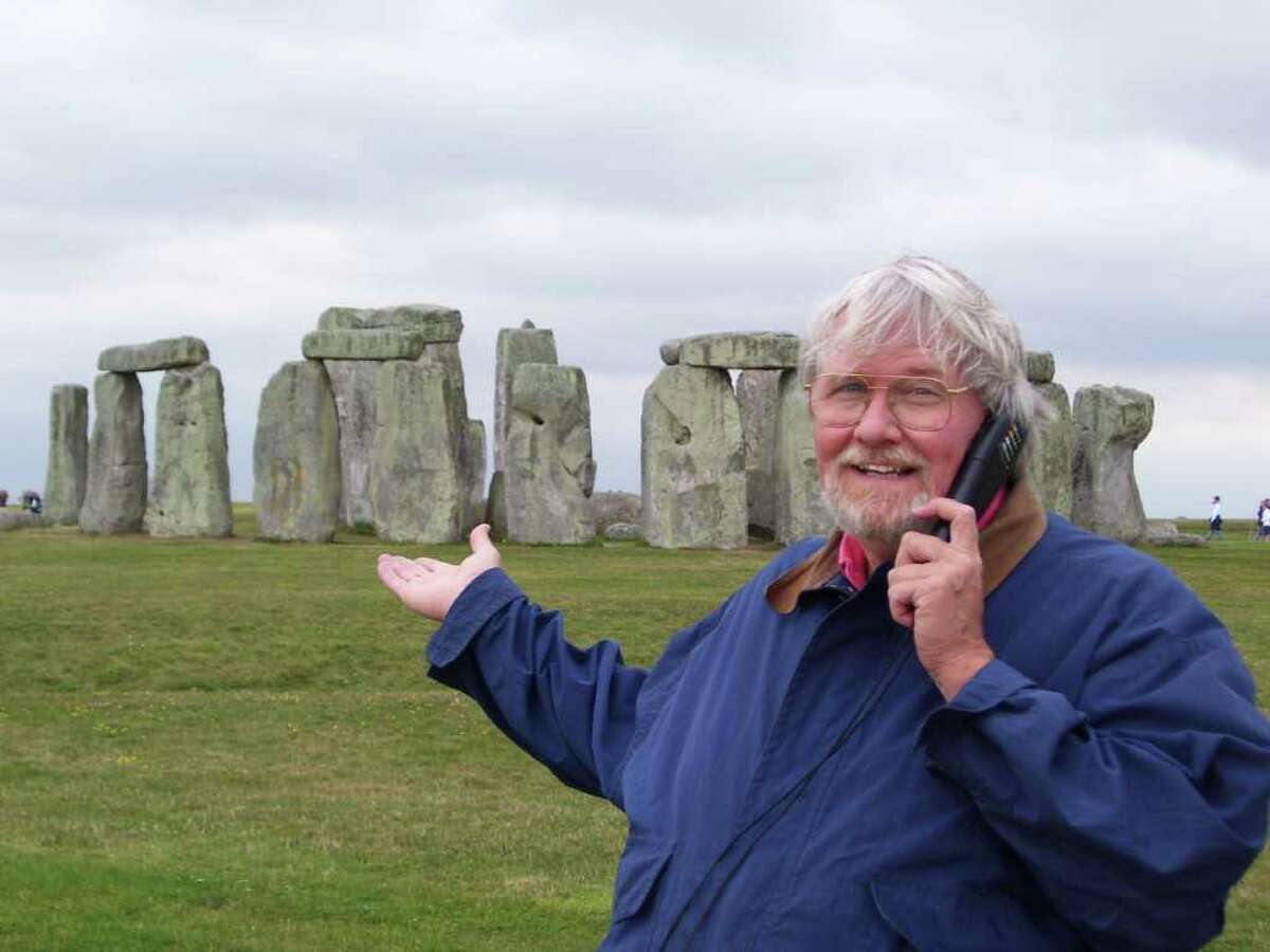 Fairfield resident Rob Carlson stands in front of England's prehistoric, mysterious circle of upright stones better known as Stonehenge. Carlson, who will debut his "Rob's Discount Variety" at the Fairfield Theatre Company this weekend, joked that he wouldn't be surprised if Stonehenge is one day replaced by condominiums.