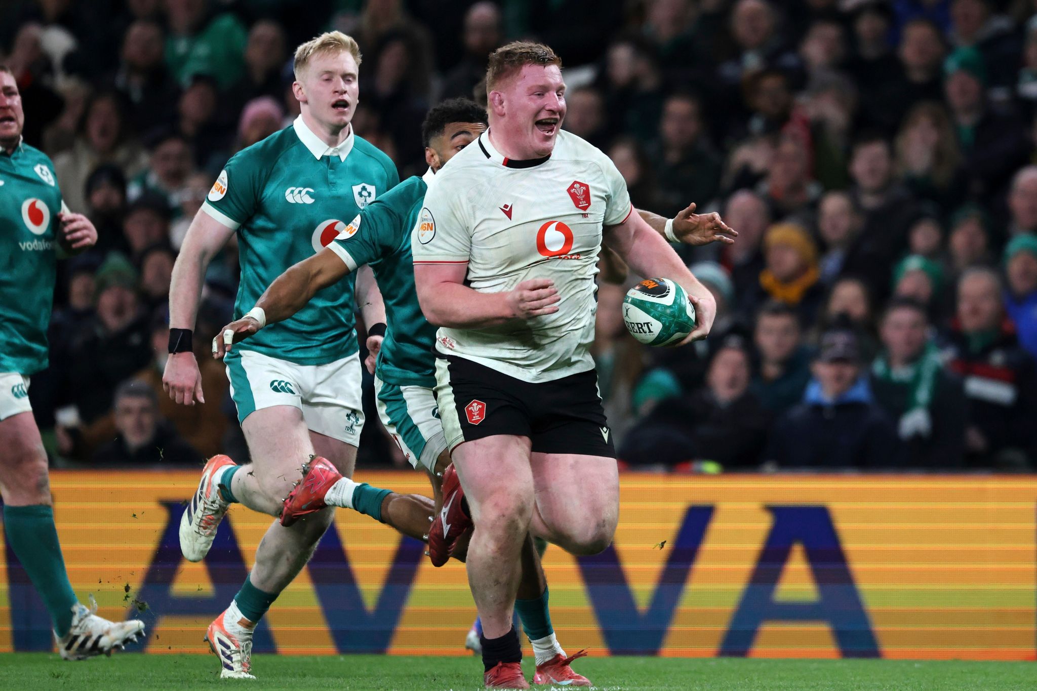 Ireland scrapes past Wales in Dublin to stay in Six Nations title race