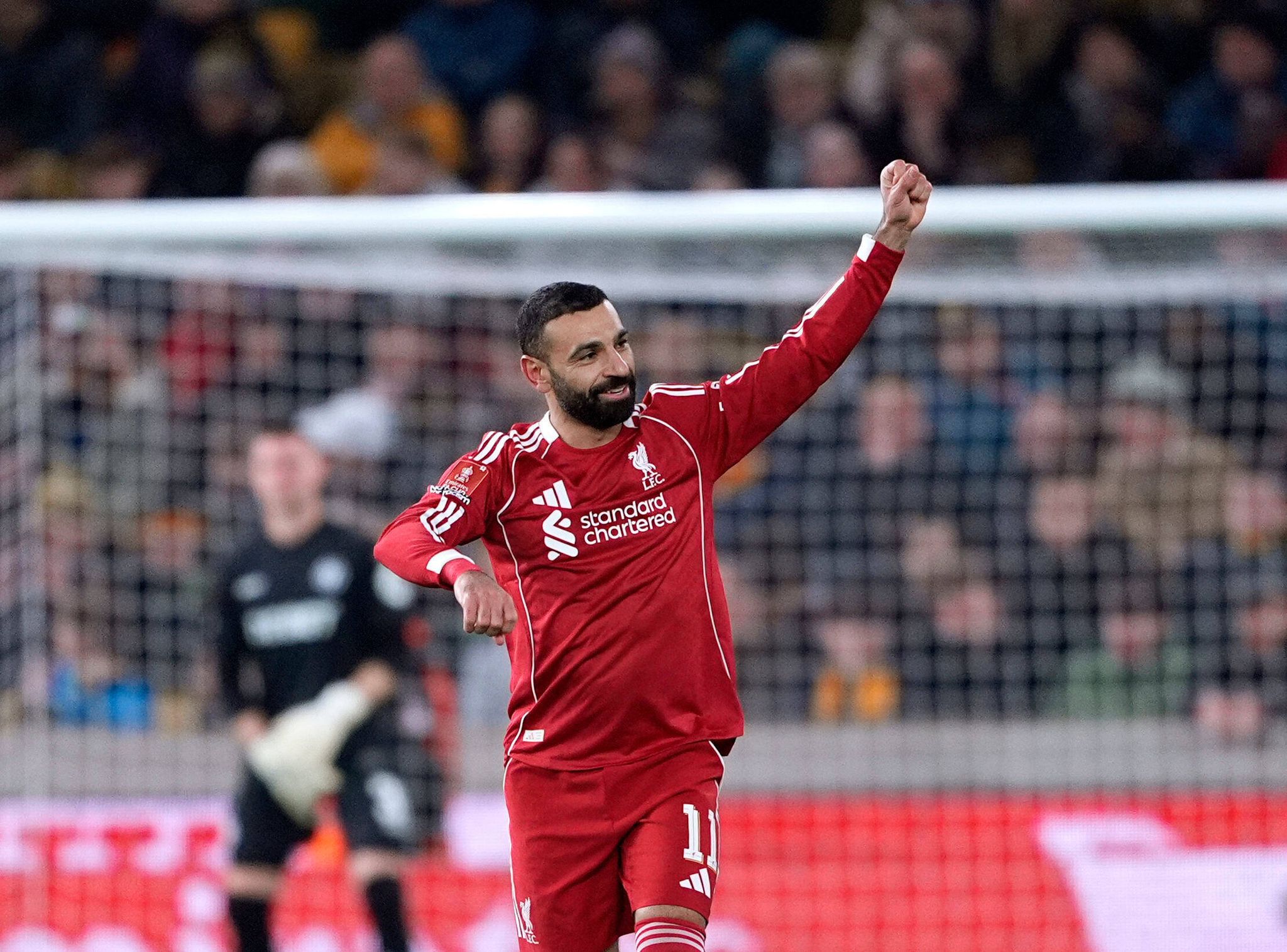 Robertson and Salah shine as Liverpool hits back to beat Wolves and ...