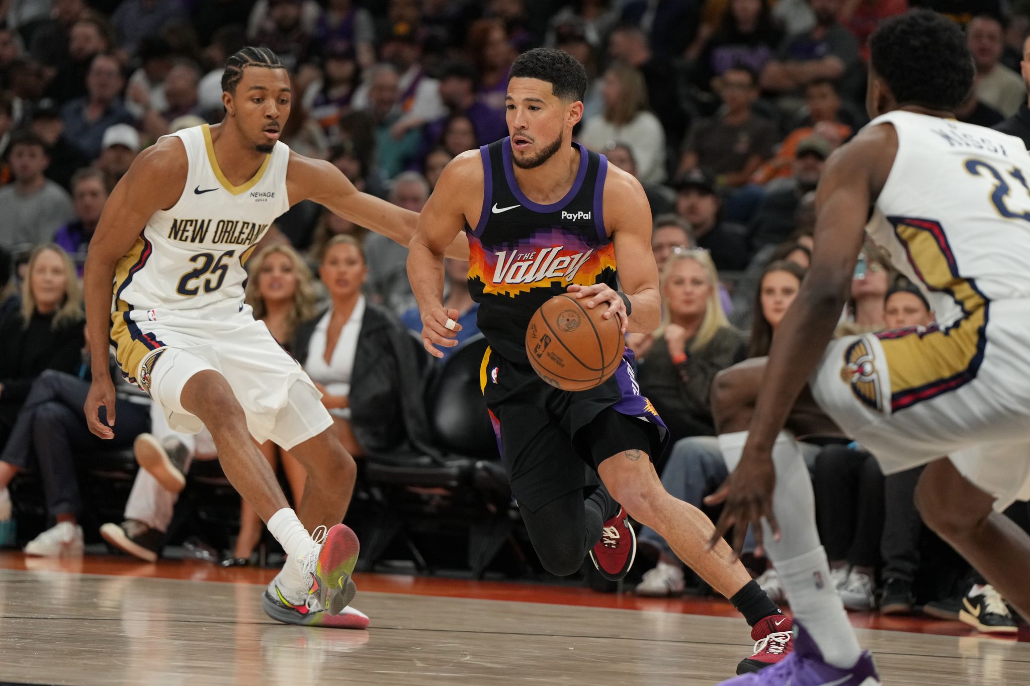 Booker scores 32 as Suns win 118-116 after Pelicans' rally falls short