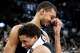 San Antonio Spurs forward Victor Wembanyama (1) is embraced by San Antonio Spurs forward Carter Bryant (11) after the San Antonio Spurs defeated the LA Clippers at Frost Bank Center in San Antonio on Friday, March 6, 2026. The Spurs defeated the Clippers 116-112.