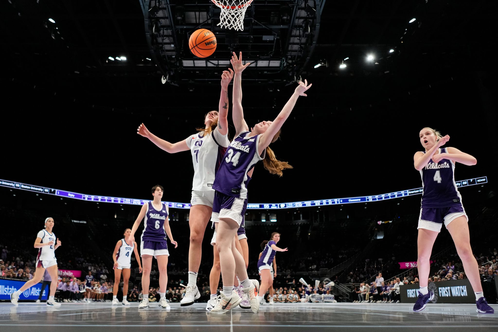 Harrison helps No. 15 West Virginia beat No. 10 TCU 62-53 for the women ...