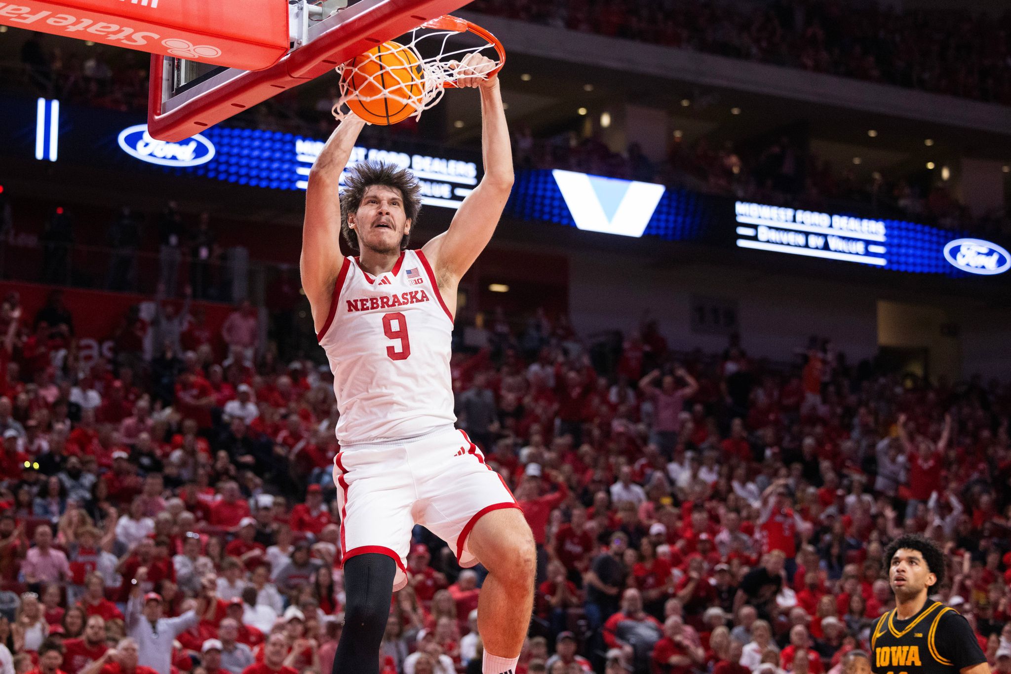 Cale Jacobsen scores 15 and No. 9 Nebraska beats Iowa 84-75 in overtime ...