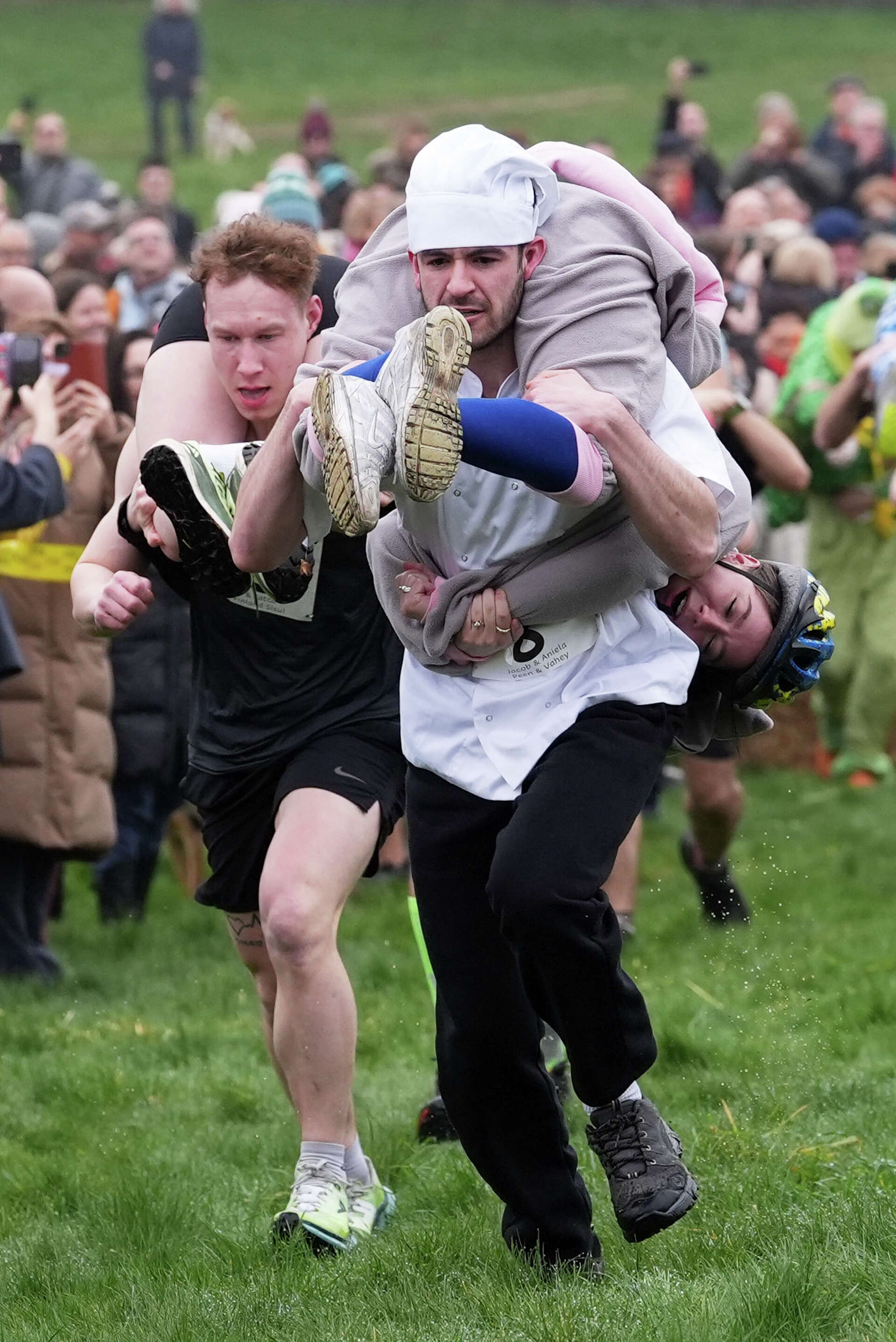 Fullerap Finnish pair wins a barrel of ale in annual 'wife-carrying' contest in ...