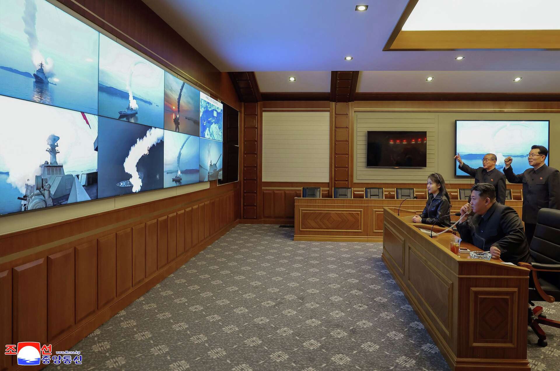 North Korean leader Kim watches cruise missile tests with his daughter