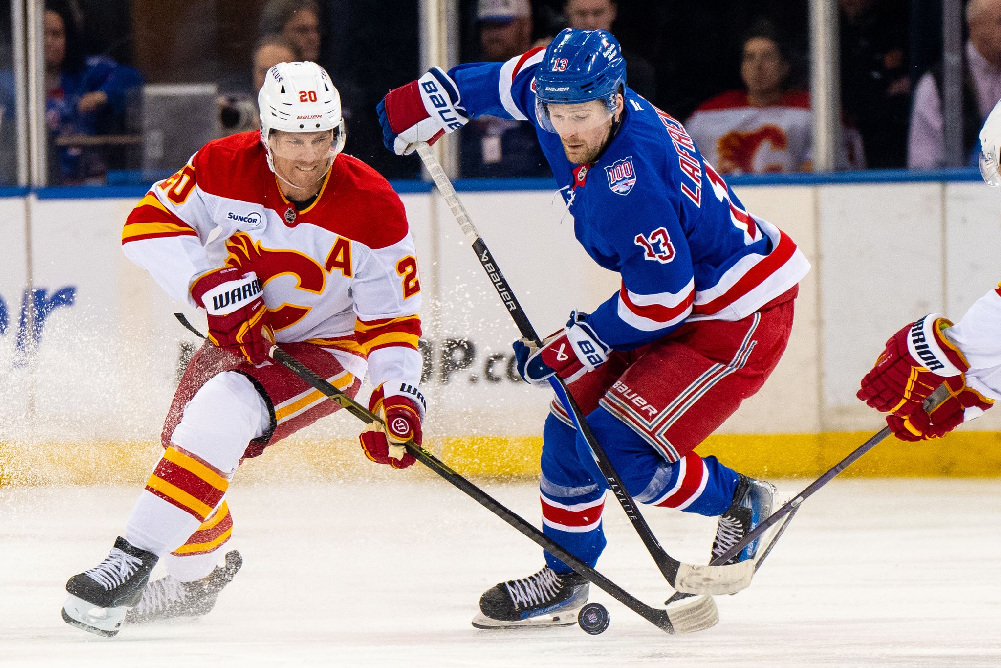 Alexis Lafreniere's hat trick leads Rangers over Flames 4-0