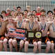 The Greenwich boys swim team celebrates after winning the class LL CIAC Championship on Tuesday, March 9, 2026, at the Cornerstone Aquatics in West Hartford.