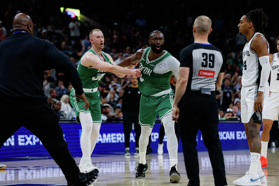 Boston Celtics guard Jaylen Brown (7) charges at referee Tyler Ford (39), resulting in his ejection from the game in the second quarter against the San Antonio Spurs at Frost Bank Center in San Antonio, Tuesday, March 10, 2026.