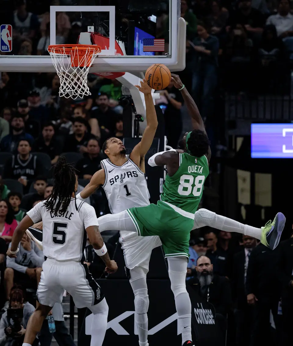 San Antonio Spurs forward Victor Wembanyama (1) blocks a shot attempt by Boston Celtics center Neemias Queta (88) during the first quarter at Frost Bank Center in San Antonio, Tuesday, March 10, 2026.