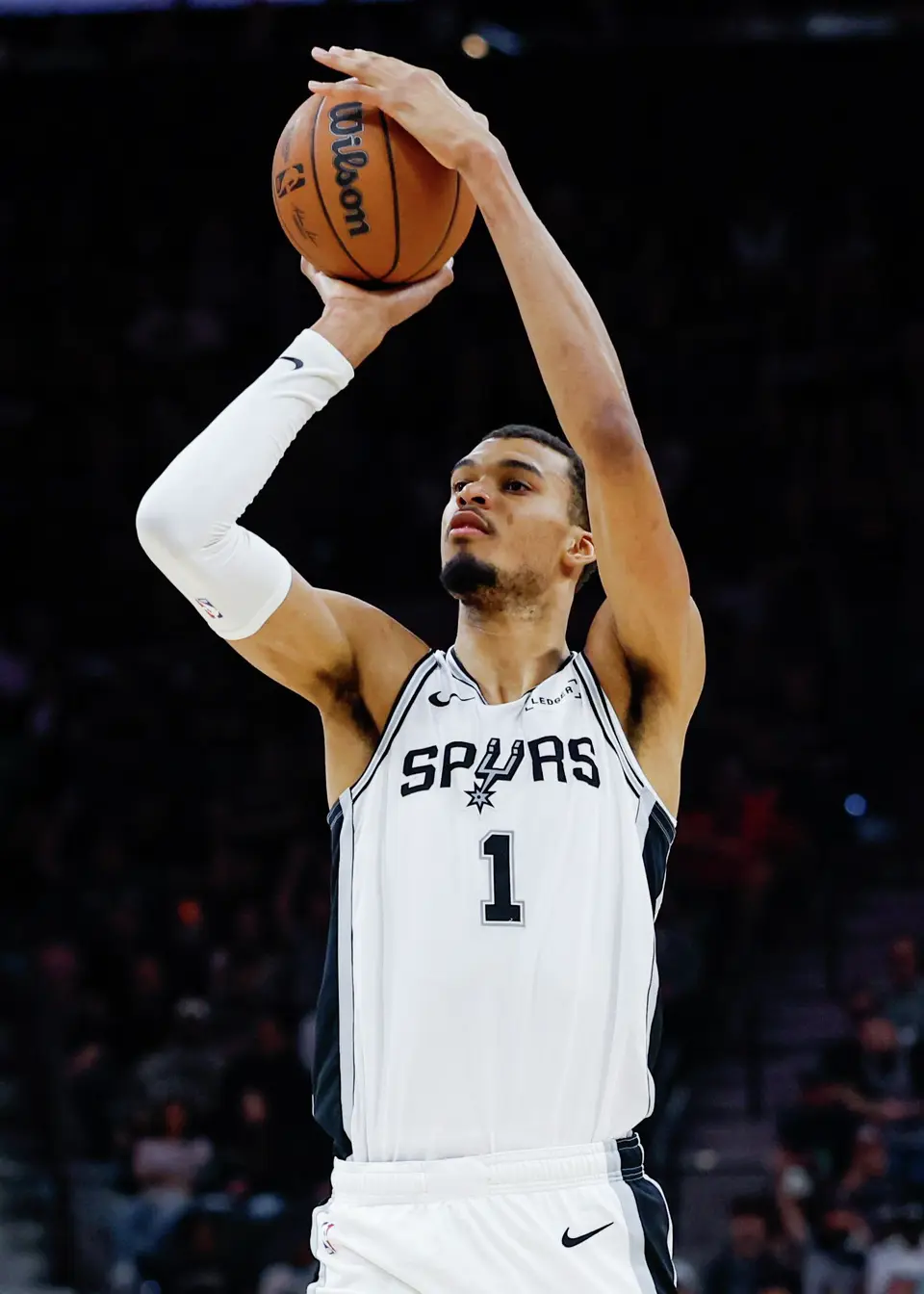 San Antonio Spurs forward Victor Wembanyama (1) shoots a three-pointer against the Boston Celtics during the second quarter at Frost Bank Center in San Antonio, Tuesday, March 10, 2026. The Spurs defeated the Celtics 125-116.